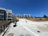 muğla kıyıkışlacık ta deniz manzaralı site içinde sosyal tesisli 2 + 1 daire