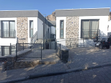 bodrum da site içinde denize yürüme mesafesinde 100 m2 müstakil bahçesi olan 2 + 1 bahçe katı sıfır reel fiyatlı daire